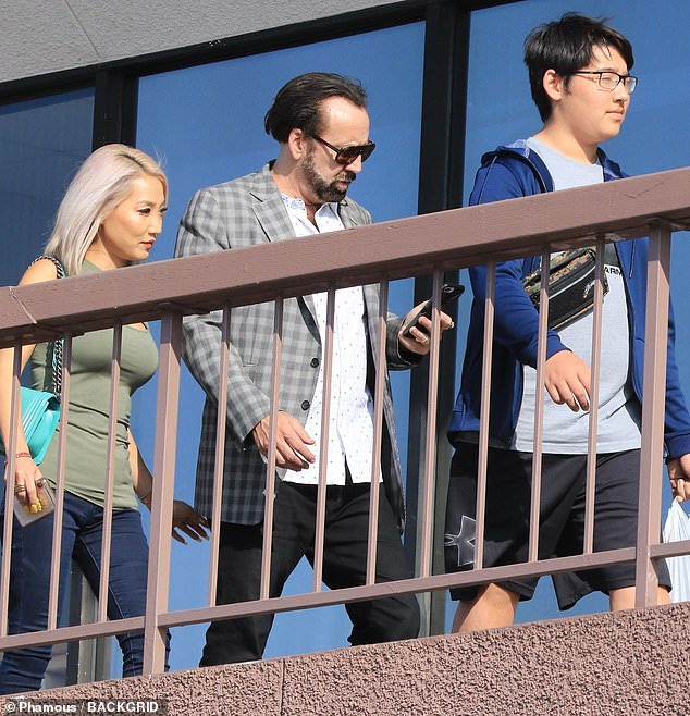 Nicolas Cage with his former wife, Alice Kim, and son, Kal-El. 
