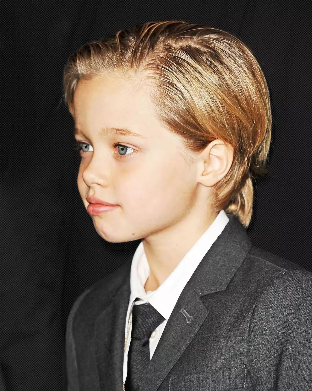 Shiloh Jolie-Pitt often sported short hair and suits when she was young. 