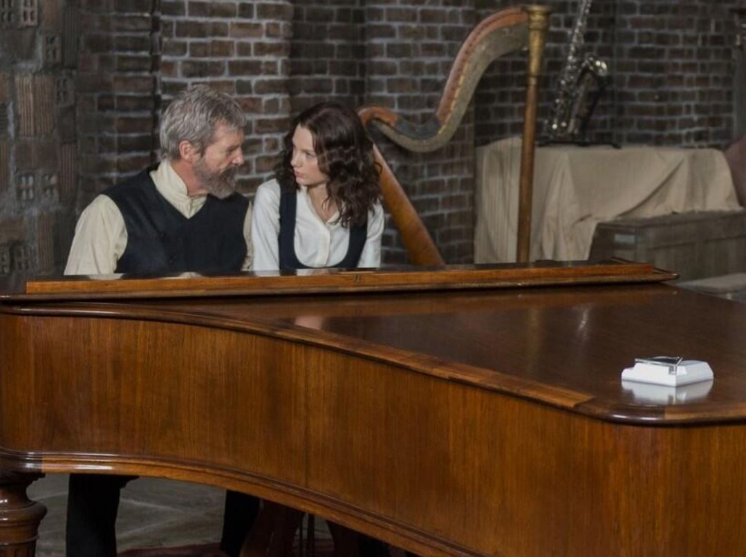 Alexander Skarsgard and Taylor Swift in the movie The Giver.