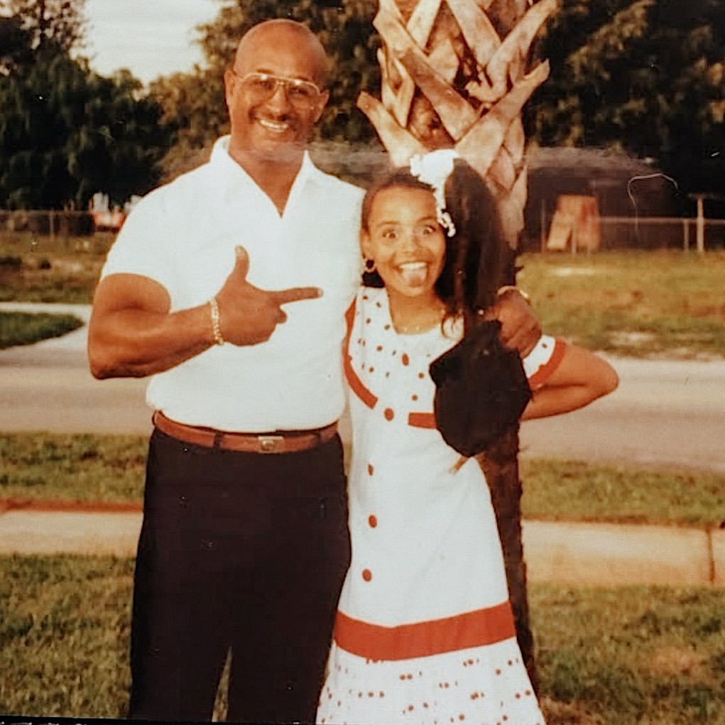 Sai De Silva posing for a photo with her father. 