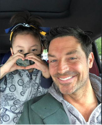 Brennan Elliott with his daughter taking a selfie