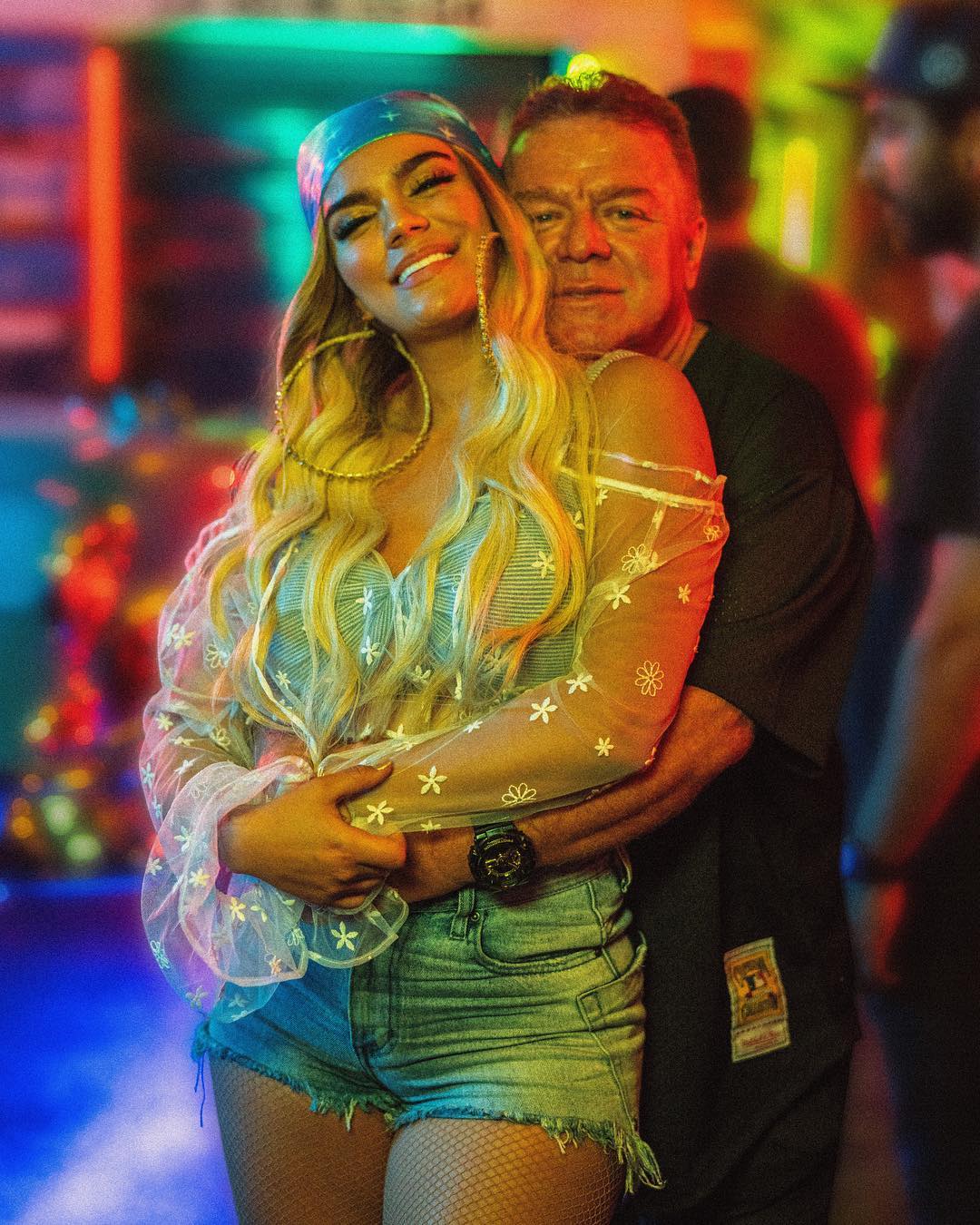 Karol G’s parents, especially her dad, pushed her towards music.