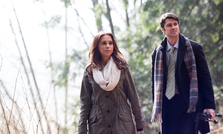 Corey Sevier and Lacey Chabert in The Tree That Saved Christmas (2014)