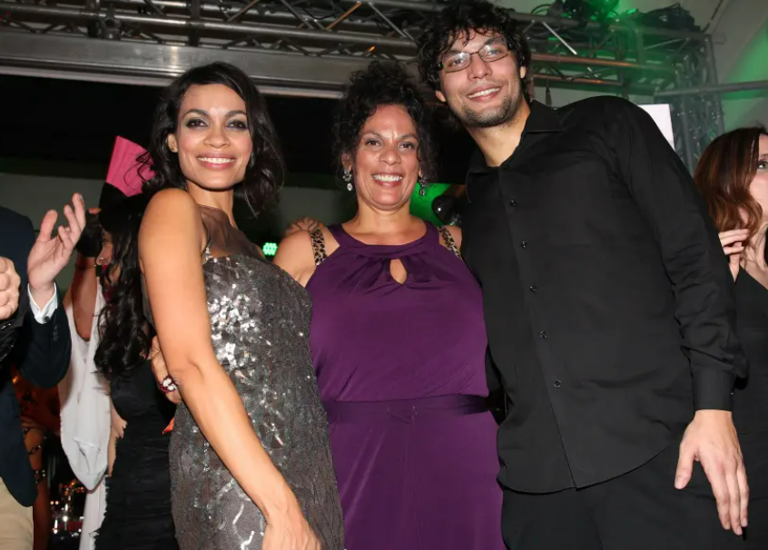 Rosario Dawson with her mother and brother