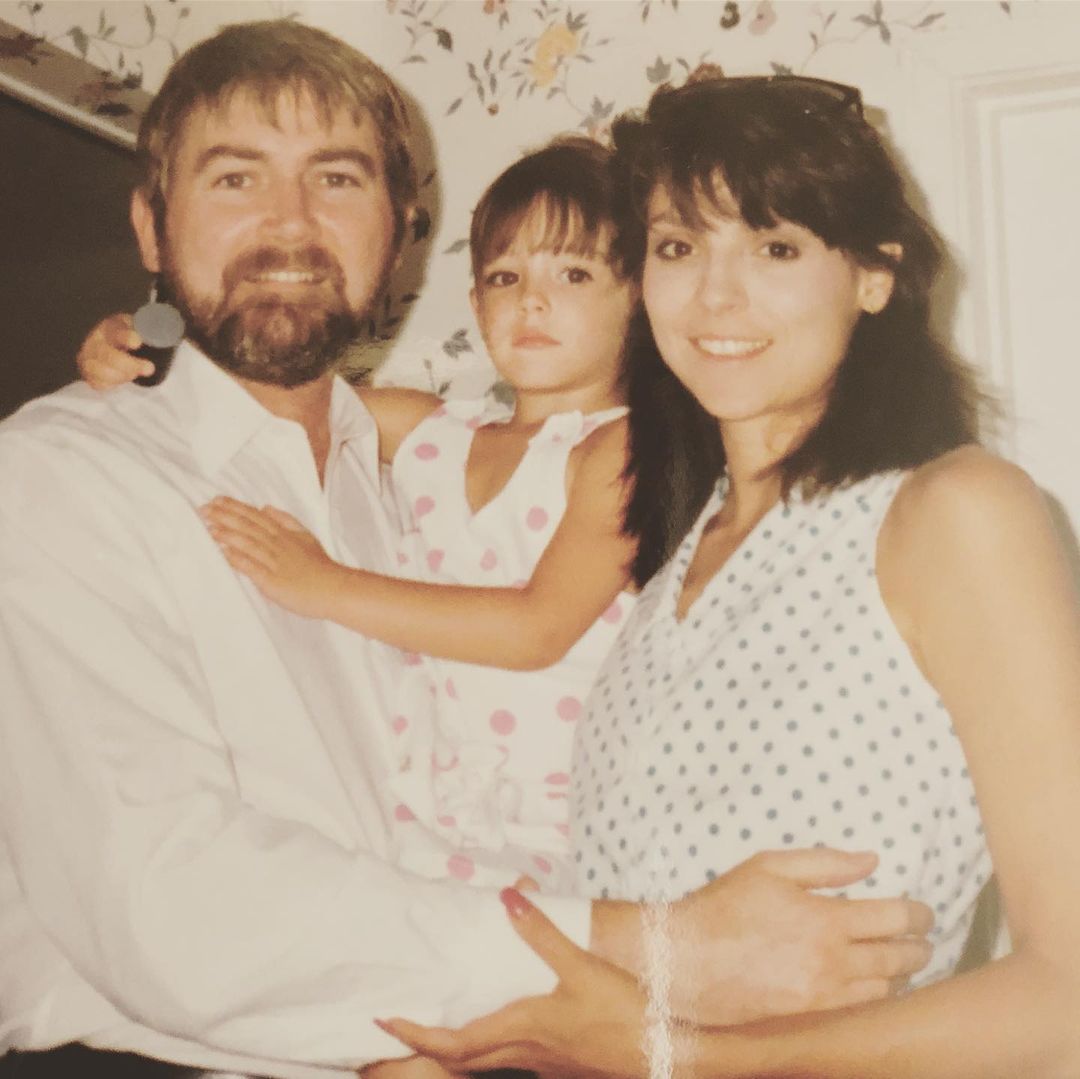 Taylor Cole with her parents. 