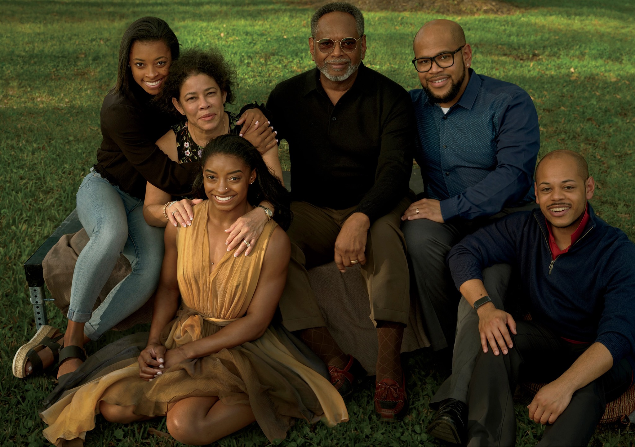 Simone Biles with her sister Adria, grandparents and her half-siblings, Ron Jr and Adam.