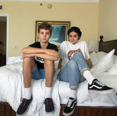 Maia Mitchell with her brother 