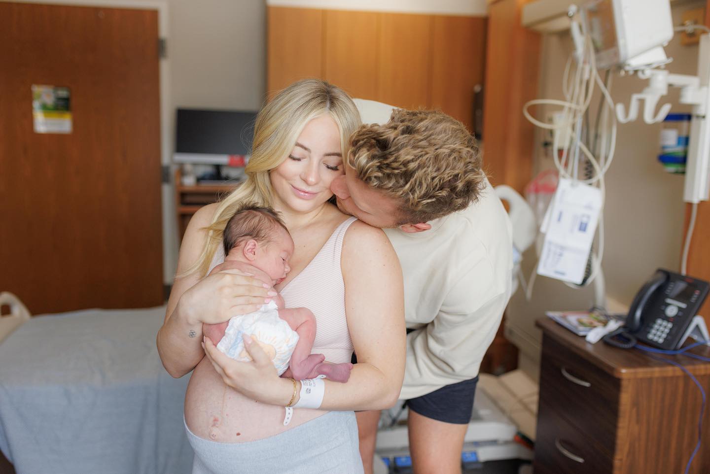 MyKayla Skinner with her baby daddy, Jonas Harmer, as she holds her baby girl