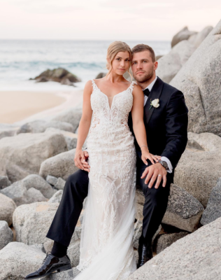 T. J. Watt with his wife, posing for a picture