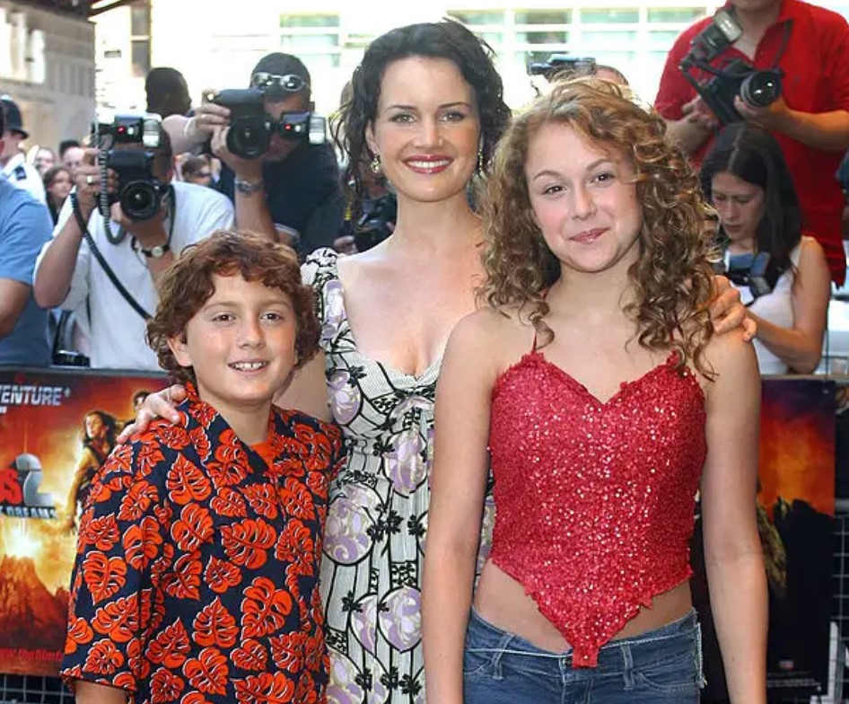 Carla Gugino alongside her on-screen children from 'Spy Kids,' Alexa Vega and Daryl Sabara. 