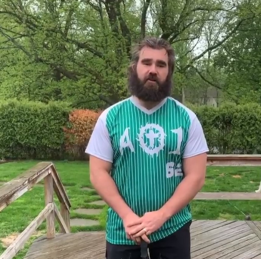 Jason Kelce standing in the backyard of his house