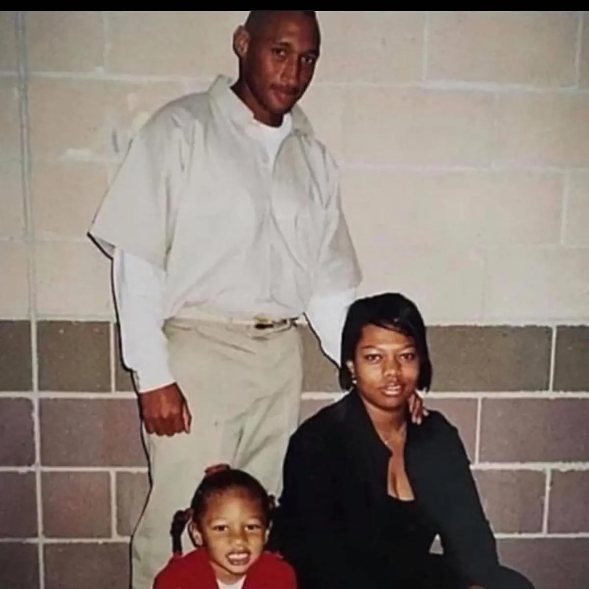 A throwback picture of a young Megan Thee Stallion with her parents