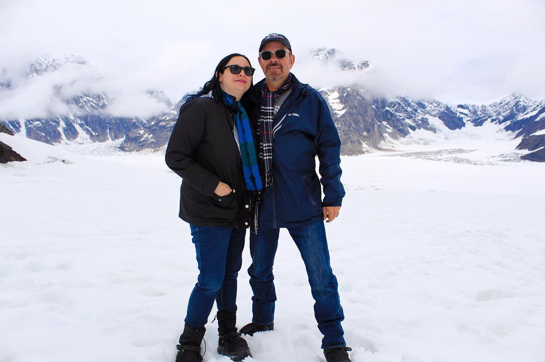 James Michael Tyler and his second wife, Jennifer Carno, standing on a glacier in Alaska