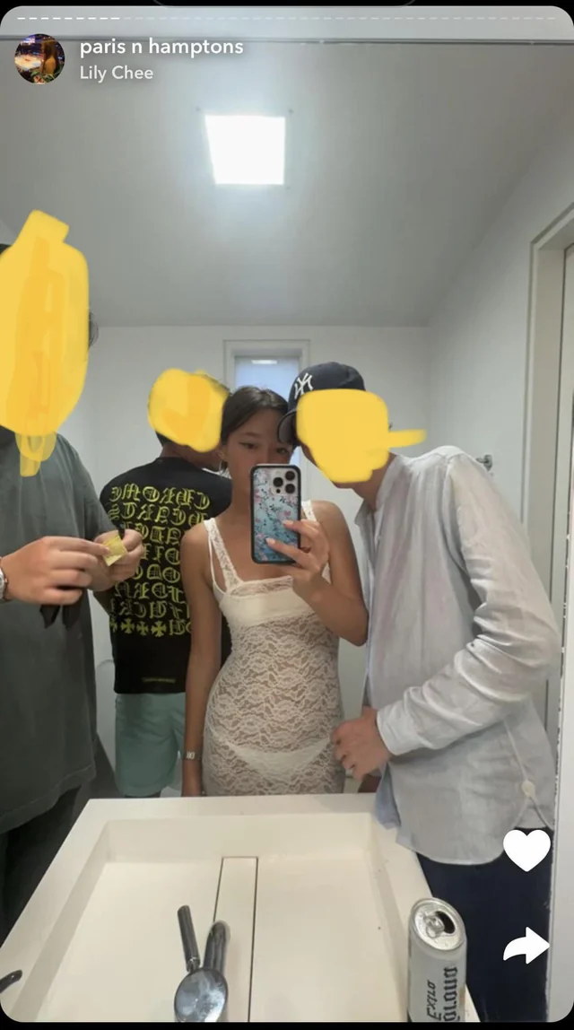 An unaltered picture showing one of Lily Chee's friends holding a packet of coke