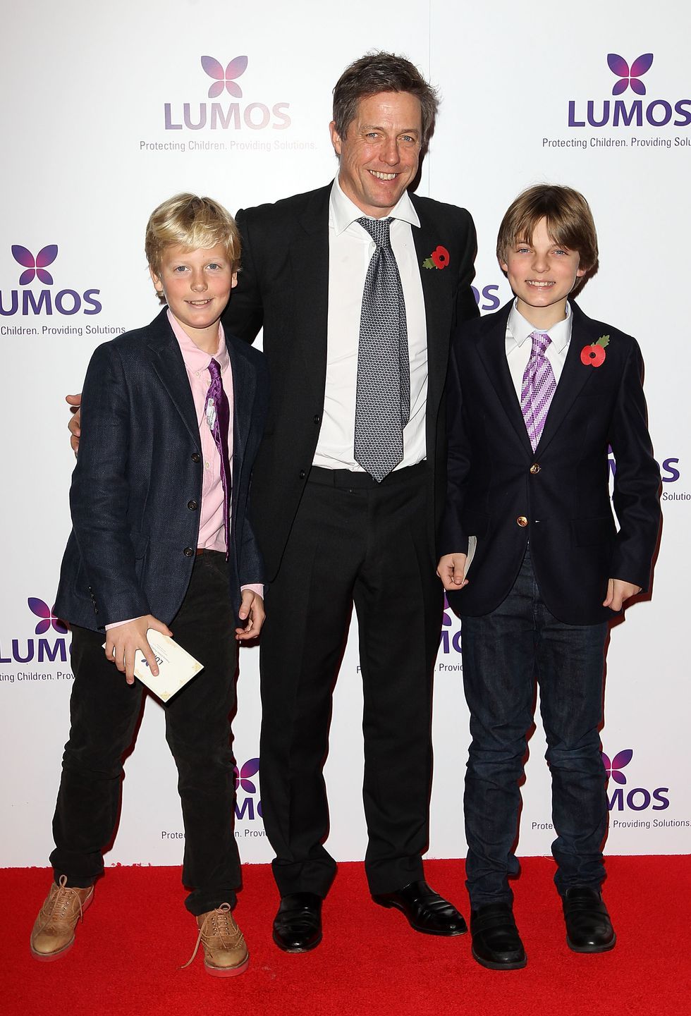 Hugh Grant with his two son