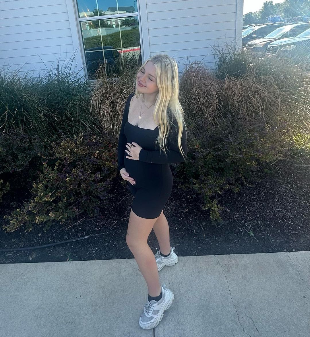 Maddie Lambert-Crowley showing off her baby bump