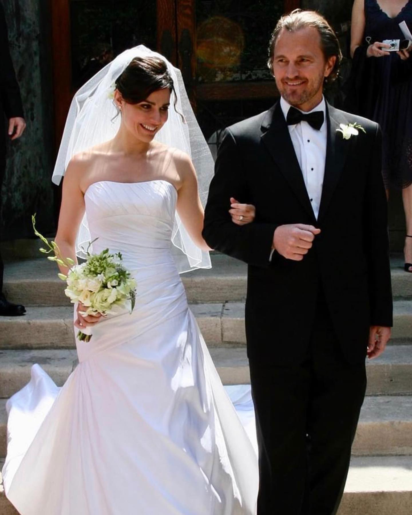 Cara Buono with her husband, Peter Thum, at their New York-based wedding