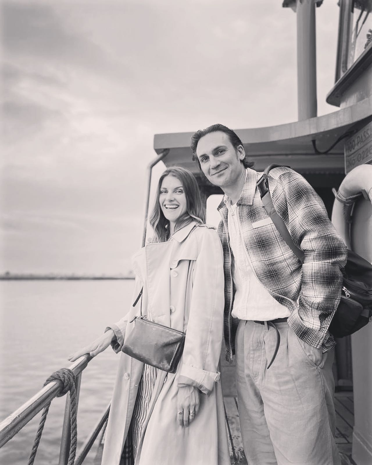 Henry Lloyd-Hughes together with his wife, Rosie Swash, on a boat
